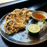 An_elegant_Japanese_dish_featuring_golden-brown_cr-1767671175670